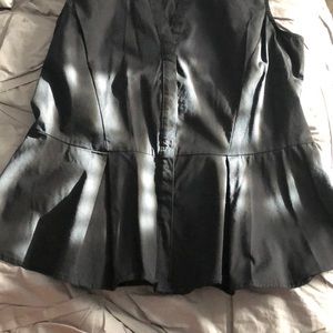 Black sleeveless button down top